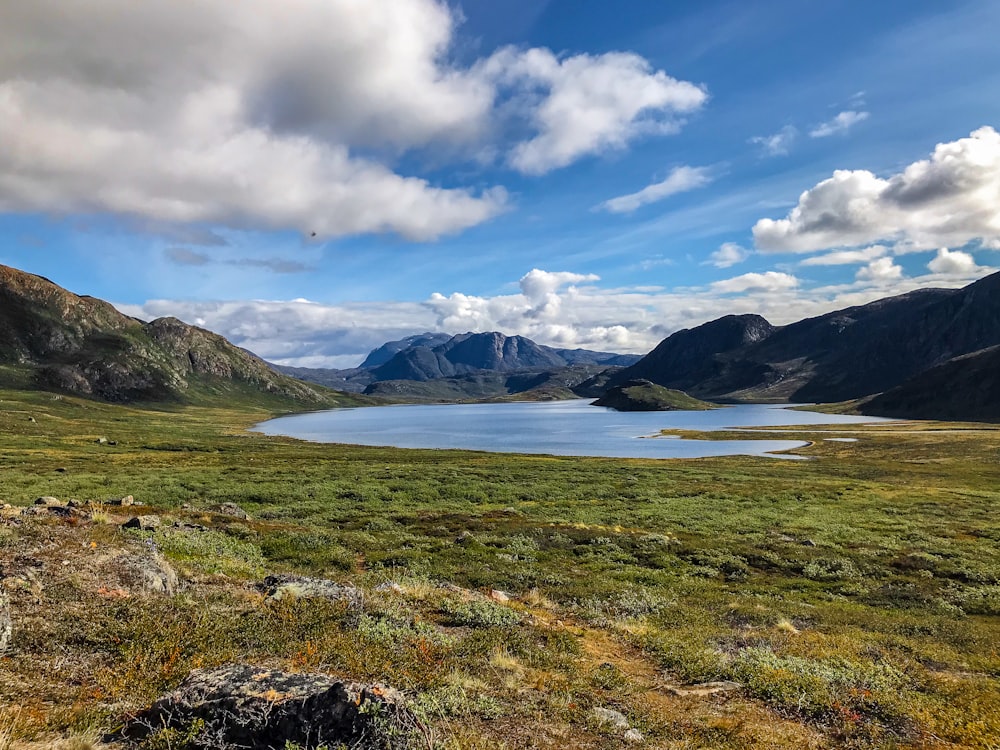 a large body of water surrounded by mountains