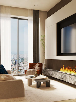 Modern living room with large windows and cozy furniture