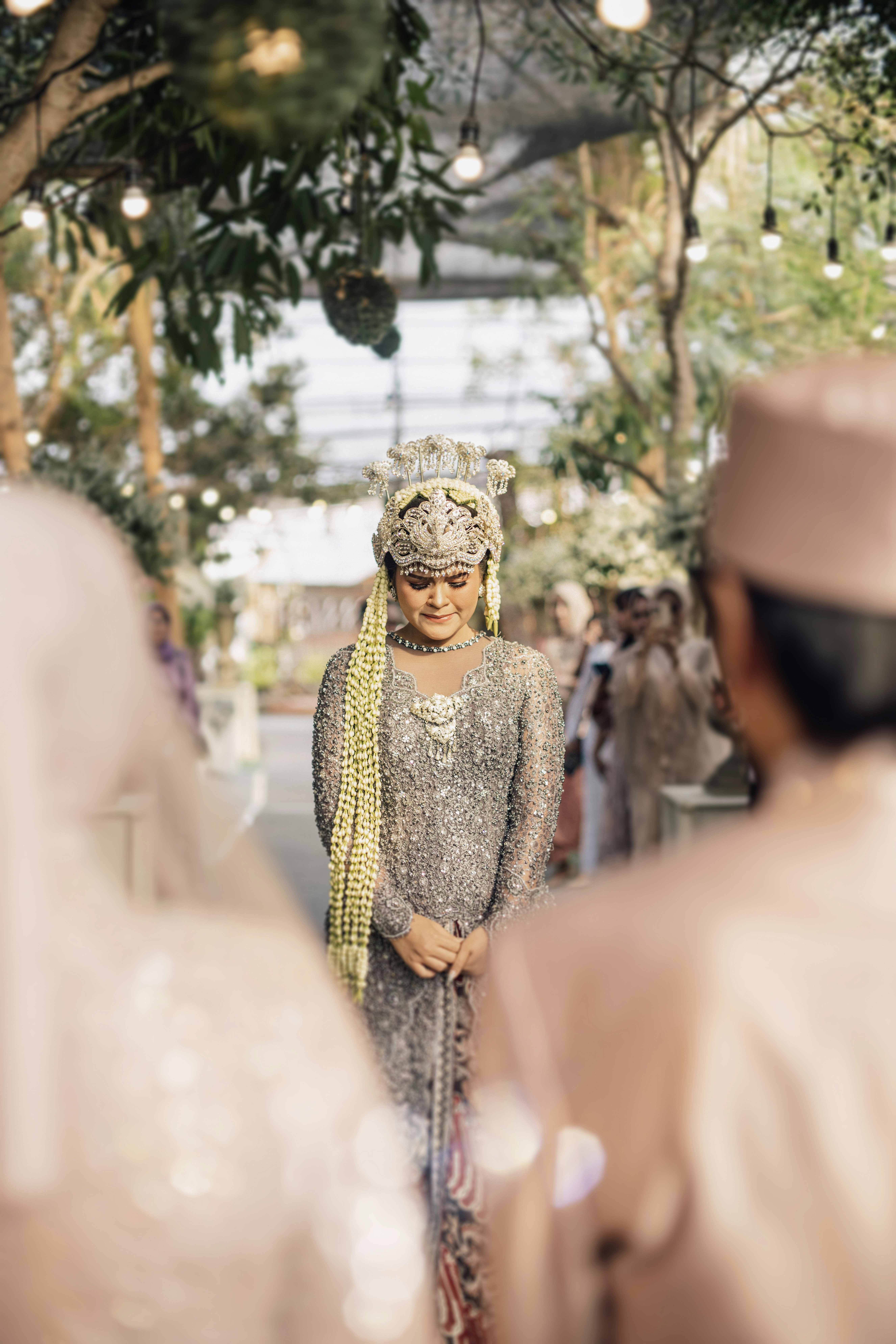 a woman in a white dress and a man in a white turban