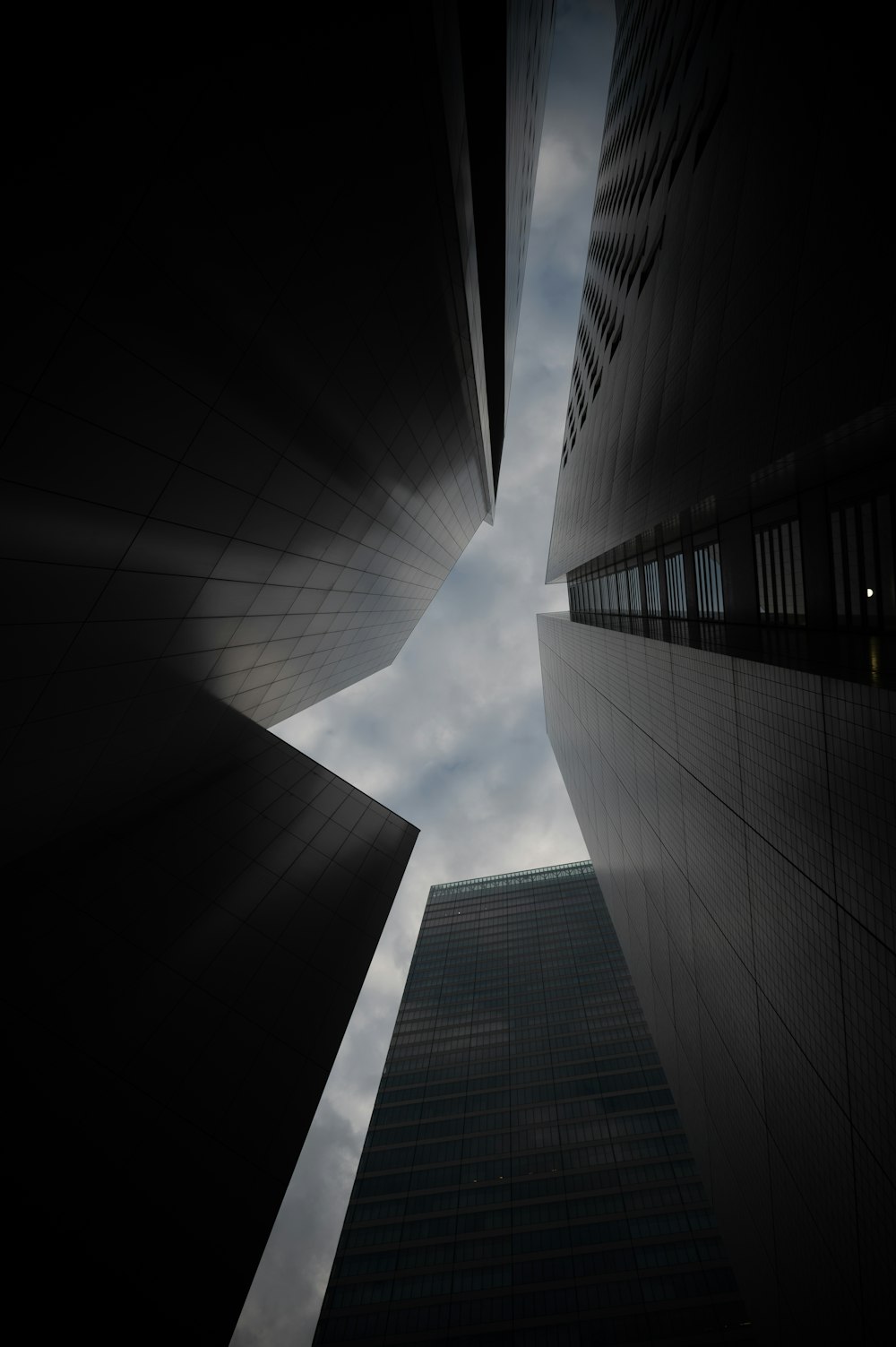 a very tall building with a sky in the background