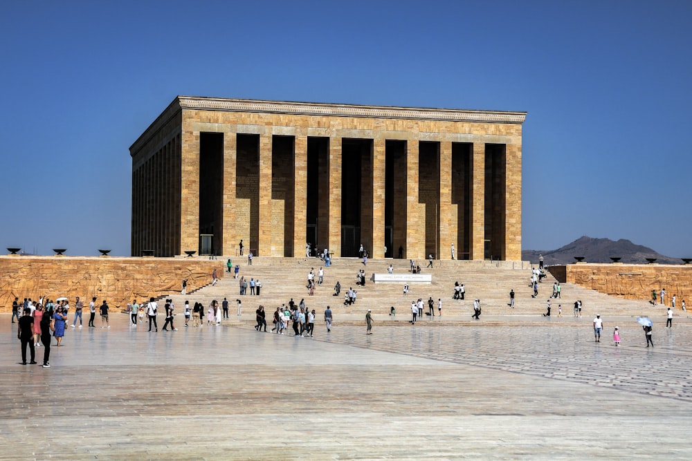 a group of people standing in front of a building