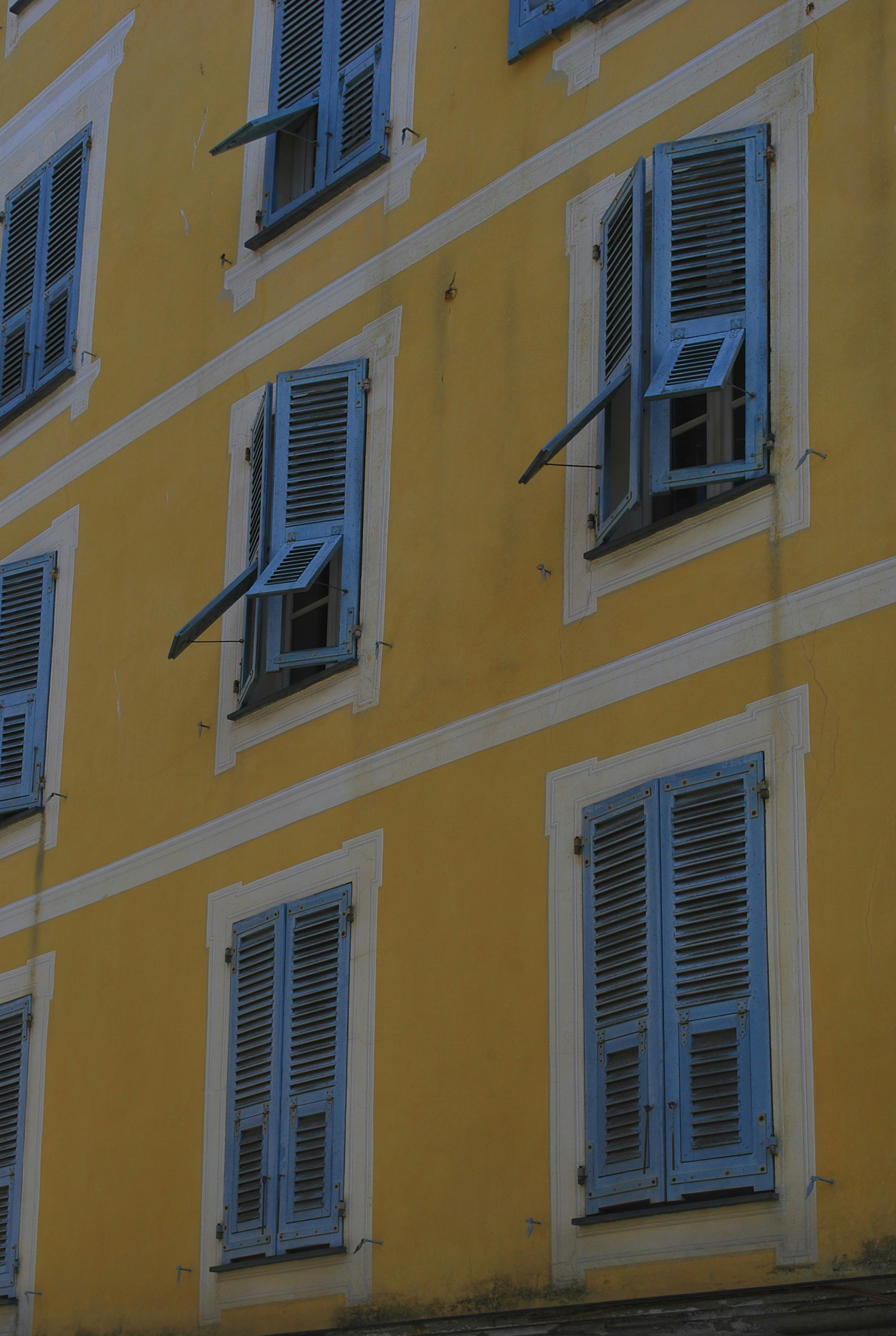 woman wearing yellow long-sleeved dress under white clouds and blue sky during daytime