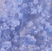 Delicate golden sparkles overlaying a soft purple background with subtle sacred geometry patterns.