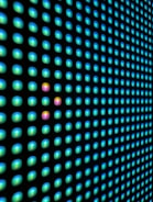 a close up of a wall with a lot of dots on it