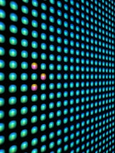a close up of a wall with a lot of dots on it
