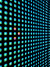 a close up of a wall with a lot of dots on it