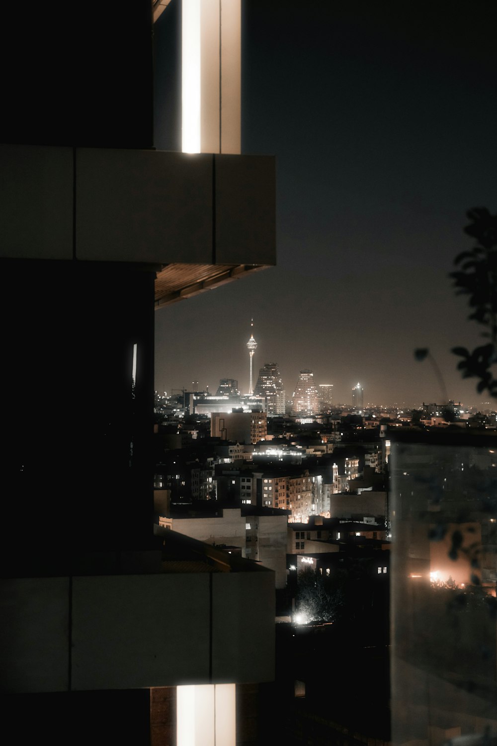 a view of a city at night from a building