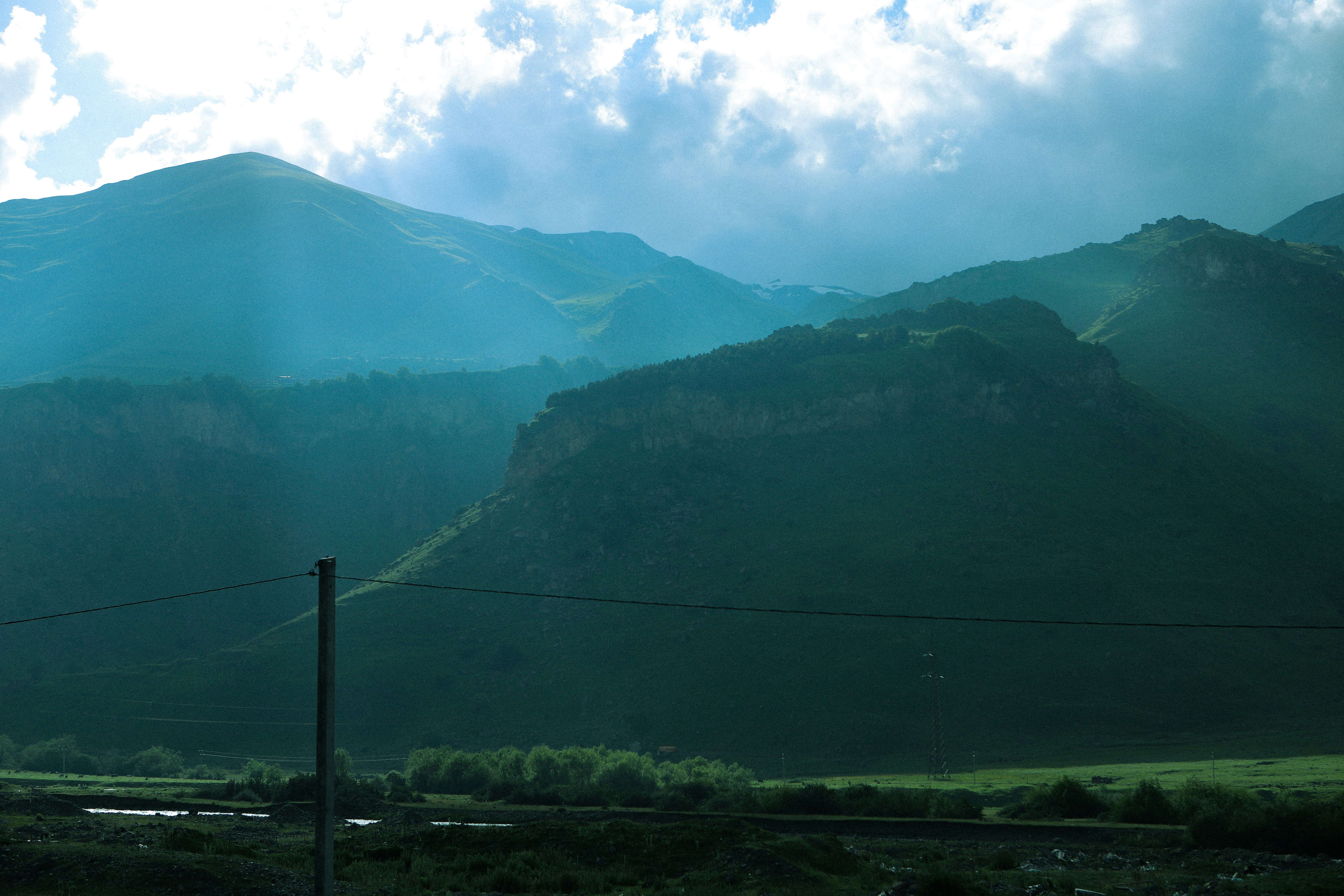 a view of a mountain range in the distance