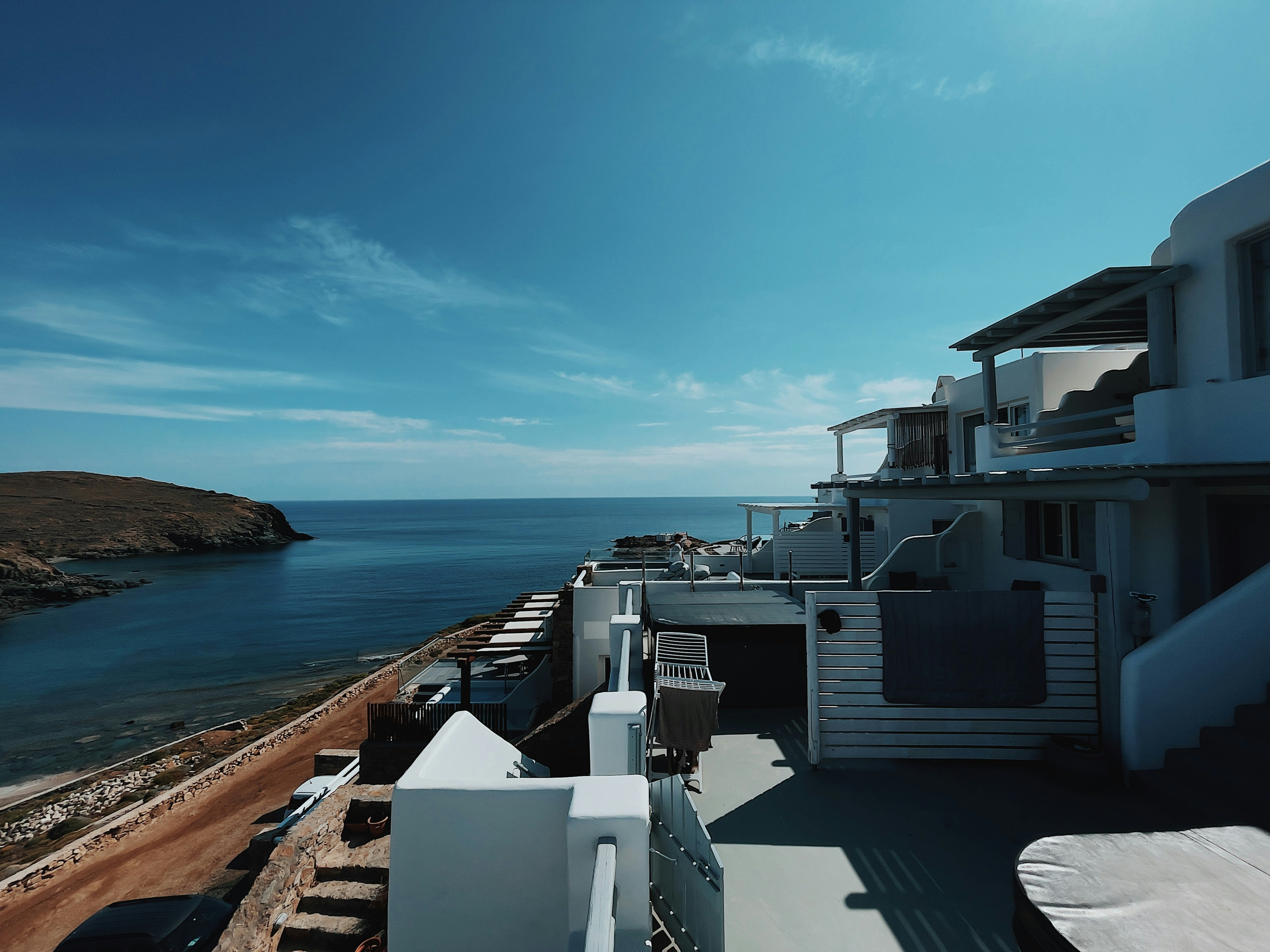 a view of the ocean from the roof of a building