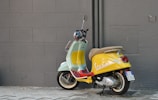 A futuristic Vespa wallpaper with modern design and colors.