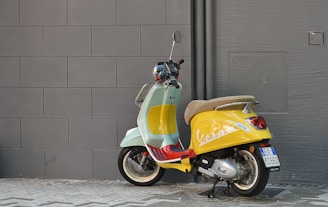 An artistic wallpaper featuring a Vespa surrounded by abstract designs.
