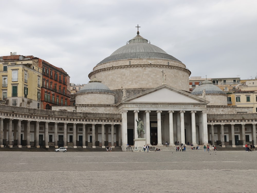 a large building with columns and a dome