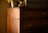 An elegant wooden valet placed stylishly on a modern dresser.