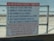 A warning sign lists several rules for a private beach property, detailing regulations such as swimming at your own risk and prohibiting animals and glass containers. The bottom section emphasizes adherence to rules with the potential consequence of being expelled or losing beach privileges.