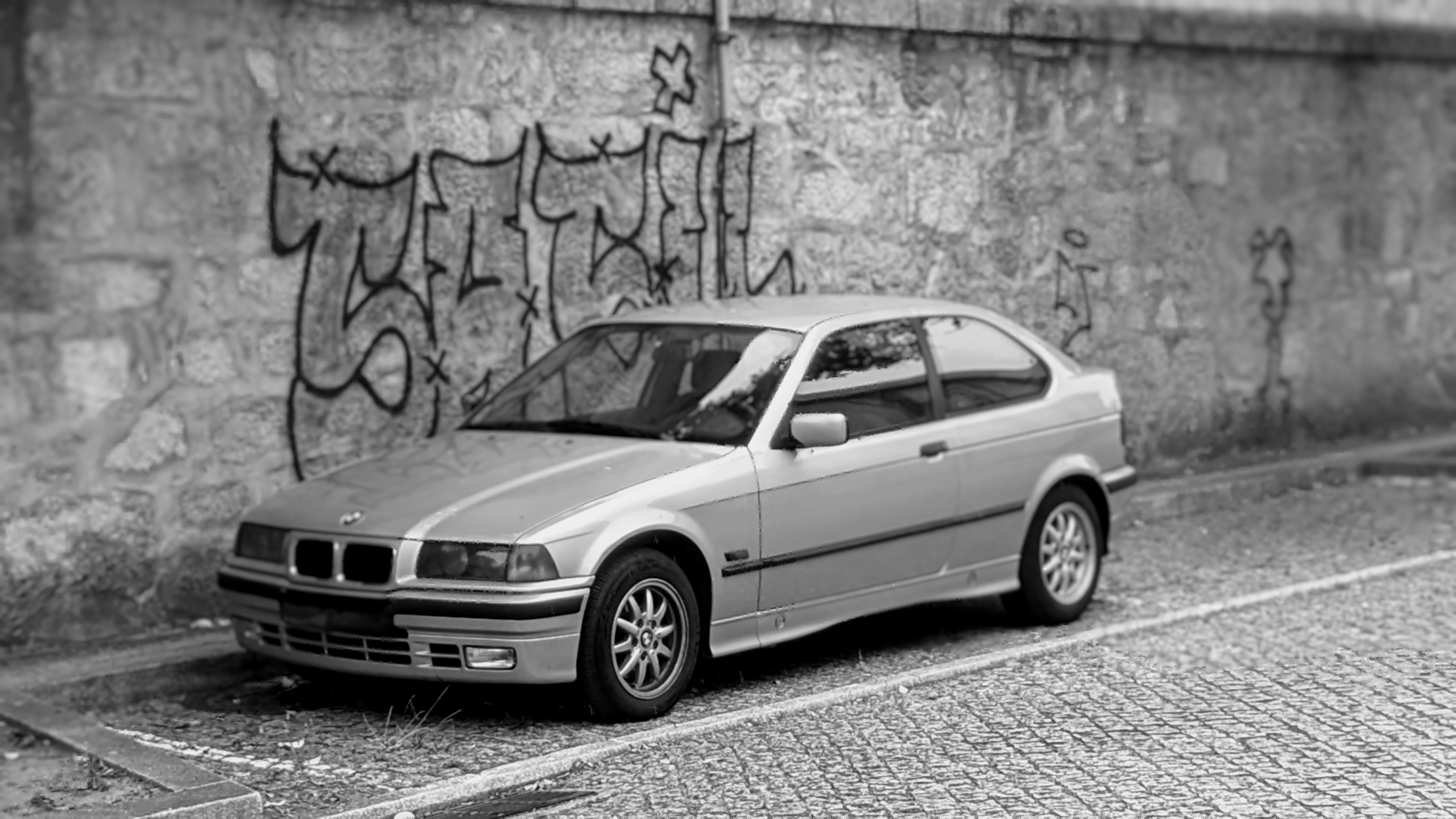 a car parked on the side of a street