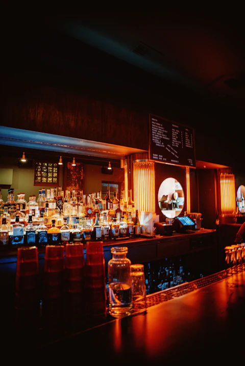 a bar with a lot of bottles of liquor