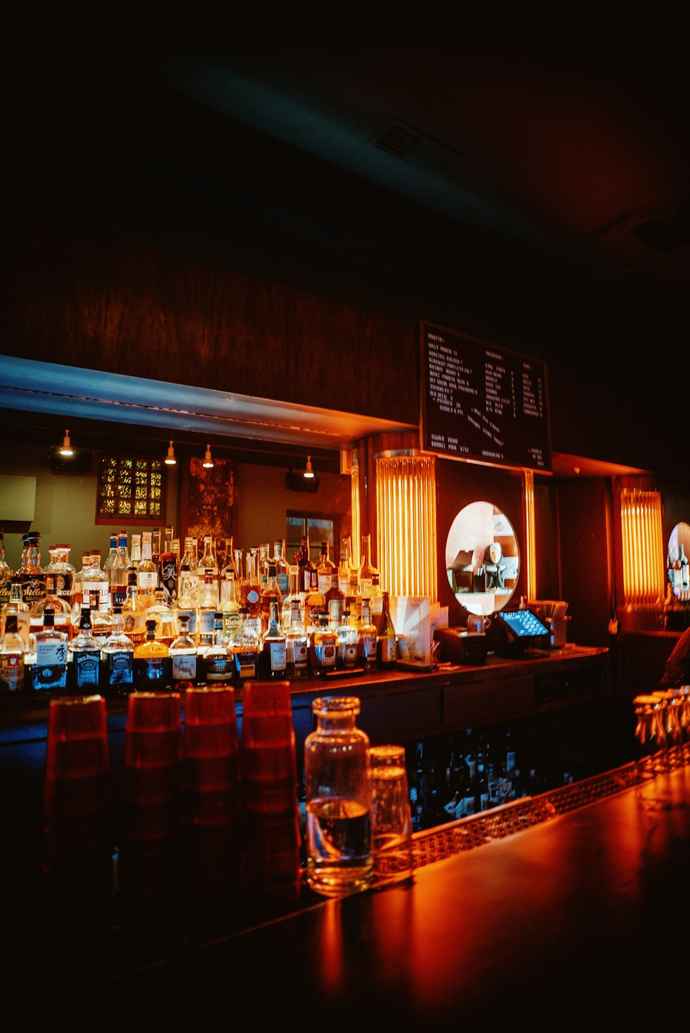 a bar with a lot of bottles of liquor