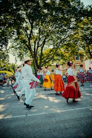a group of people that are dancing in the street