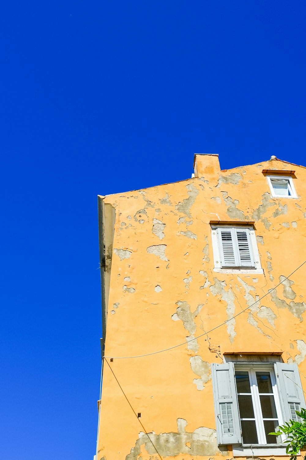 a tall building with a clock on the side of it