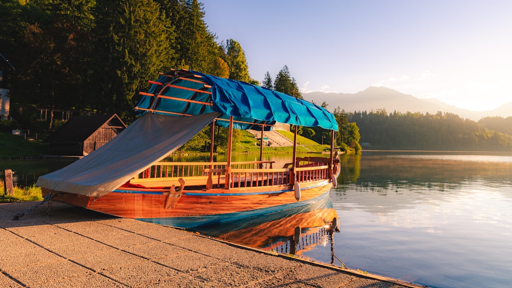 a boat sitting on top of a body of water