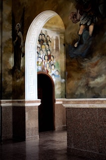 A detailed mural in a school hallway.
