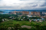 A panoramic view of a mixed-use development blending urban design with nature.