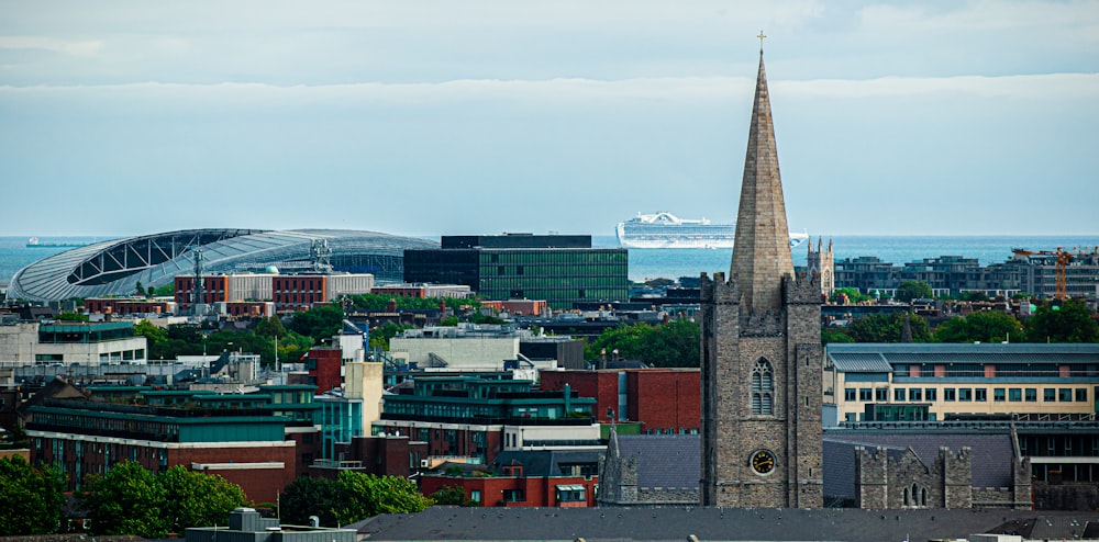 a view of a city with a boat in the background