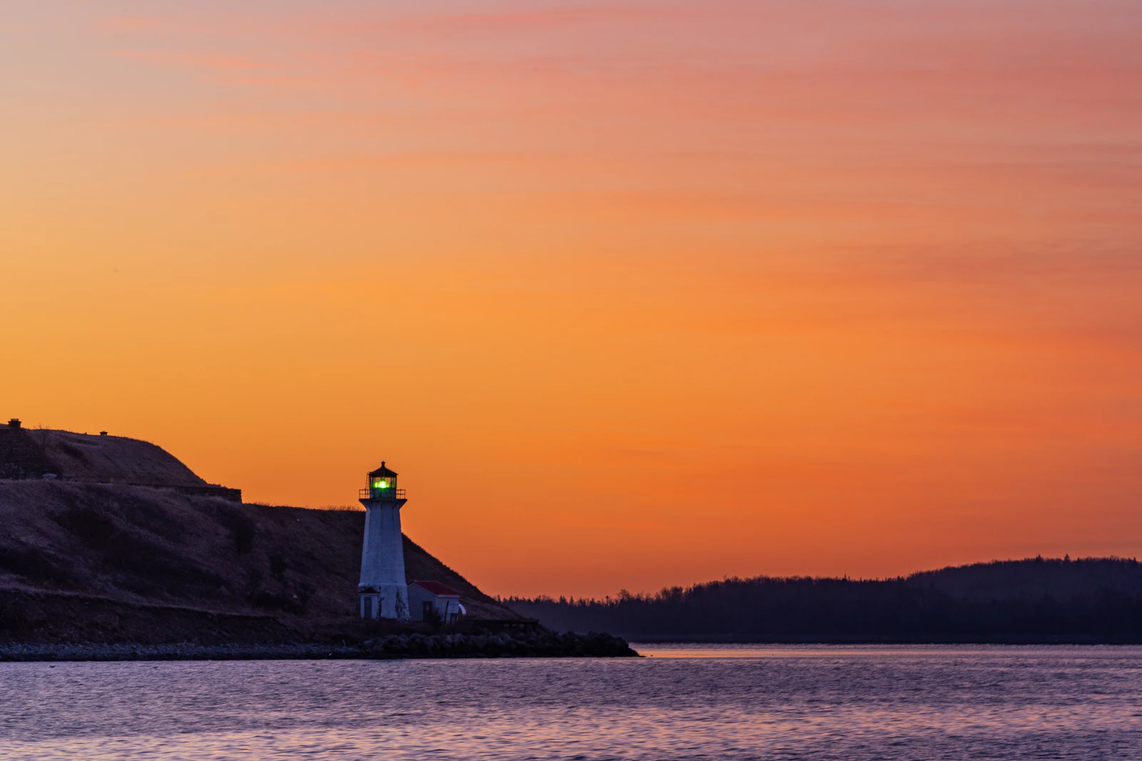 Nova Scotia lighthouse at sunset near Halifax, social media management companies in Halifax