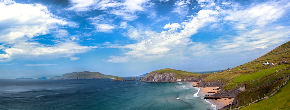 a scenic view of a beach and a body of water