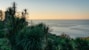 a view of a body of water from a hill