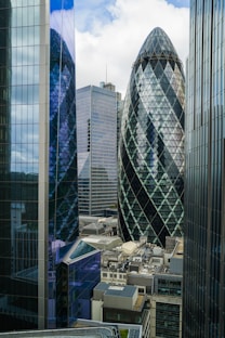 a view of some very tall buildings in the city