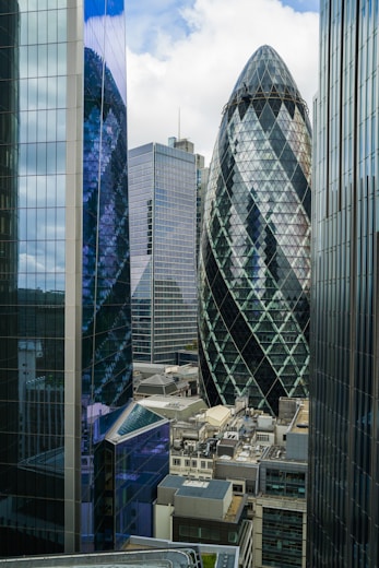 a view of some very tall buildings in the city