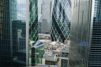 a view of some very tall buildings in the city