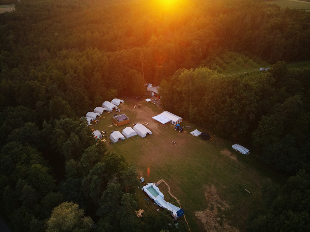 an aerial view of a camp site at sunset