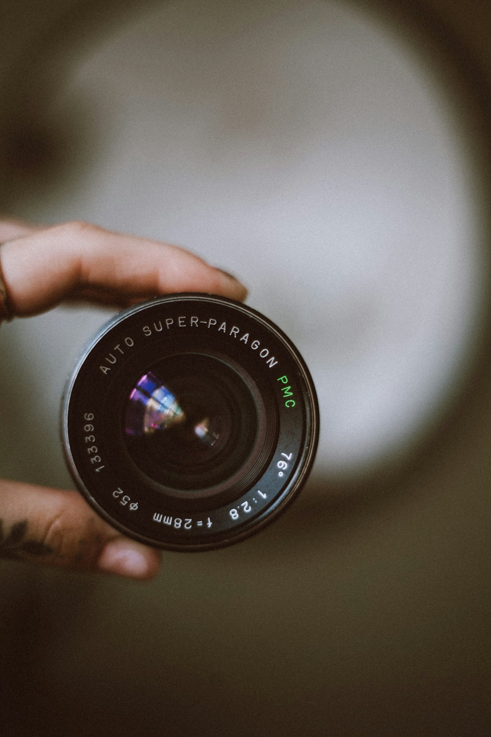 a person holding a camera in their hand