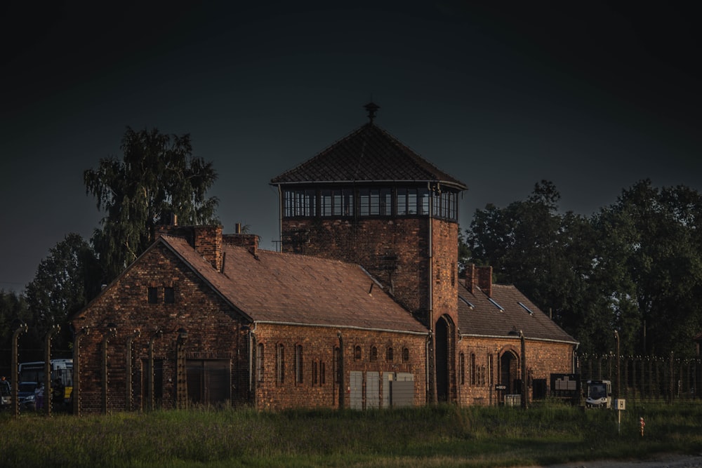 an old brick building with a clock tower