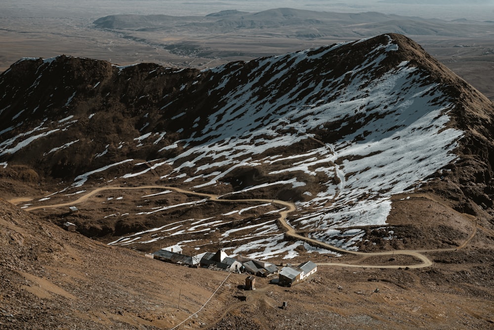 a mountain with a road going up the side of it