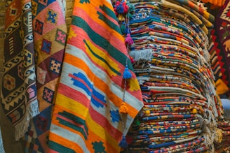 Close-up of a vibrant hand-knotted Indo-Nepal rug showcasing intricate patterns and rich colors.