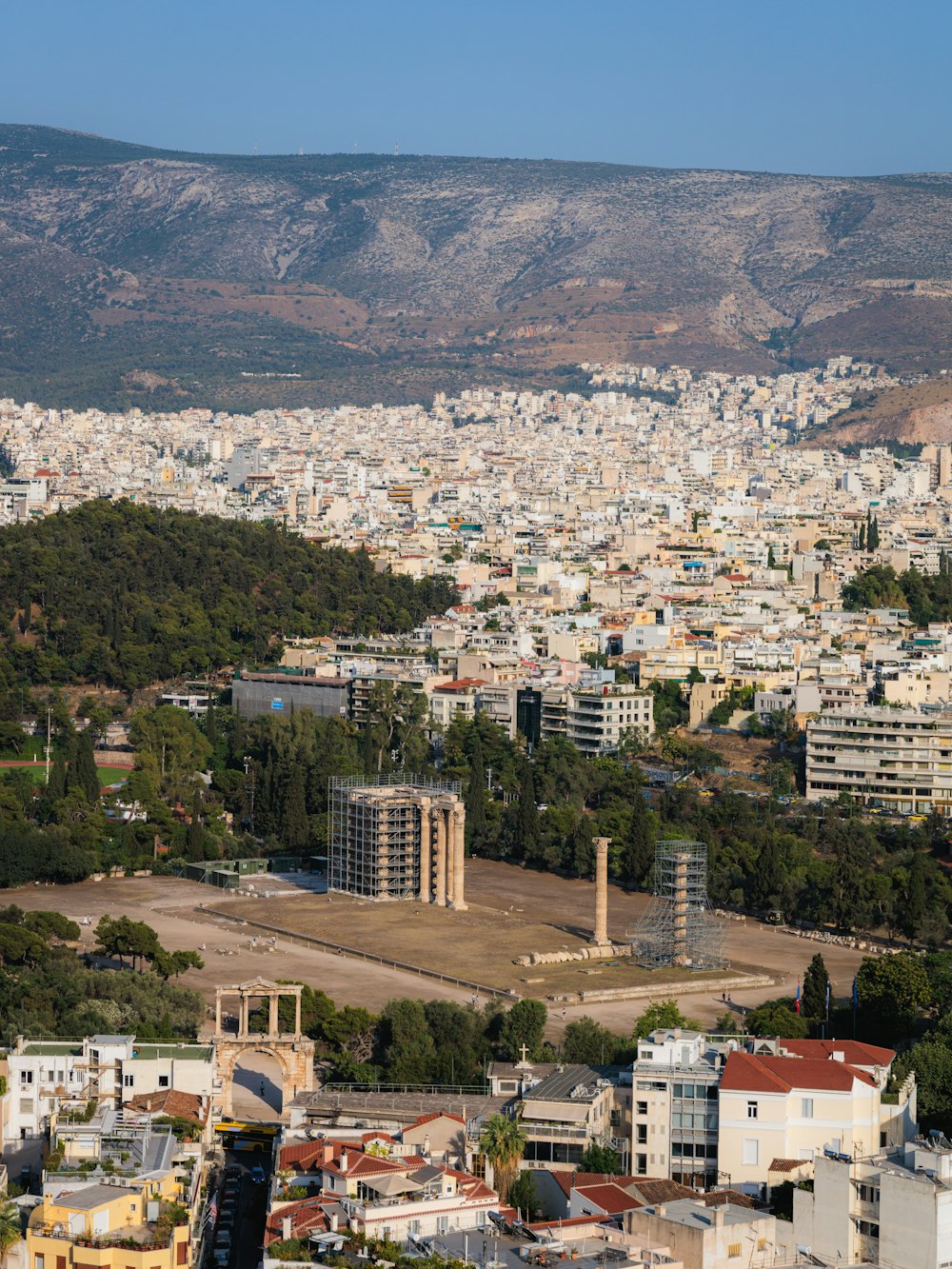 a view of a city with a mountain in the background