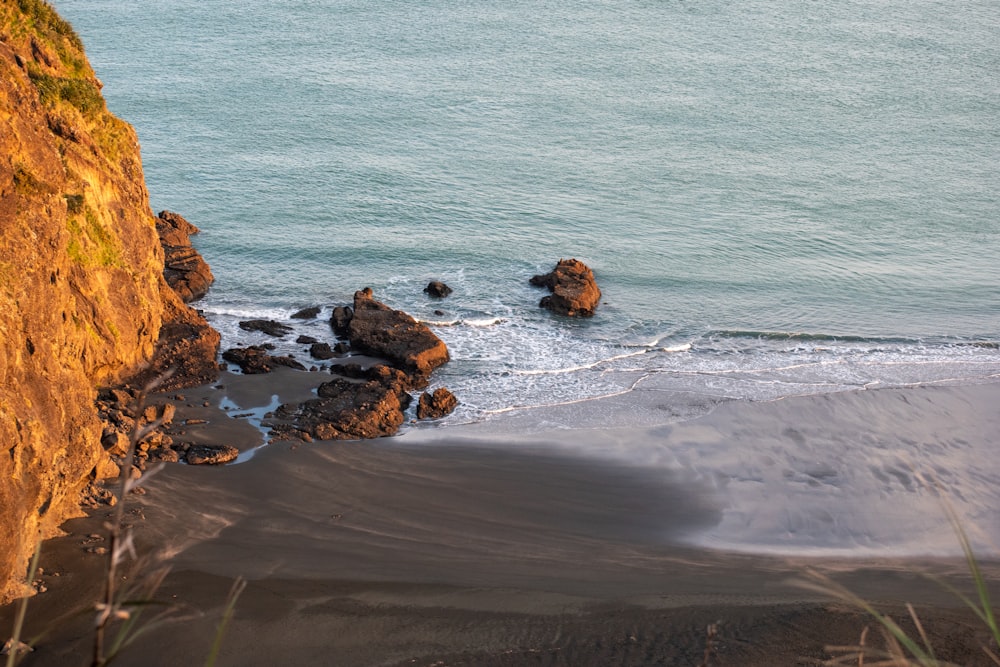 a view of the ocean from the top of a cliff