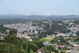 a view of a city with mountains in the background