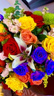 A vibrant bouquet of assorted flowers showcasing a spectrum of colors.