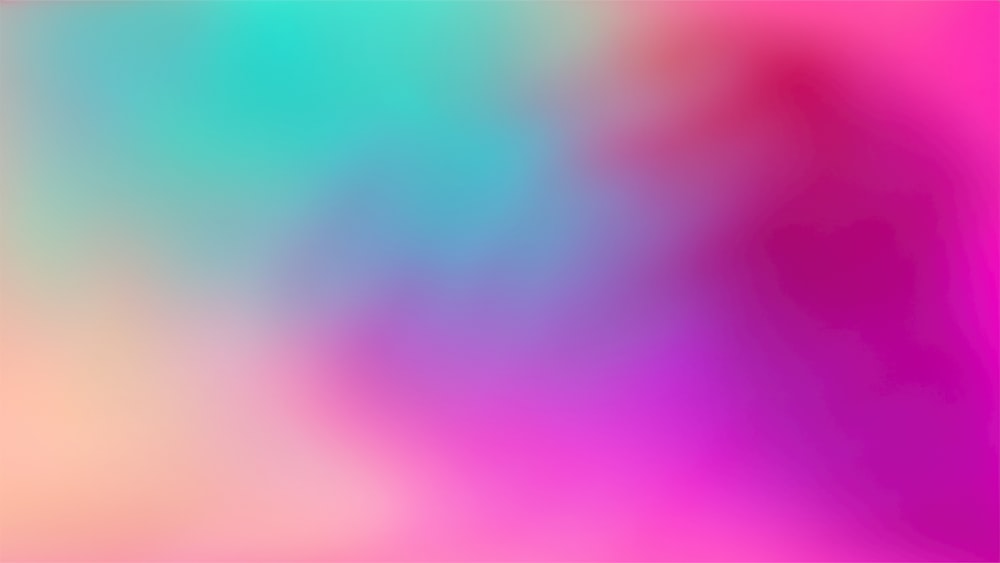 a blurry image of a pink and blue background