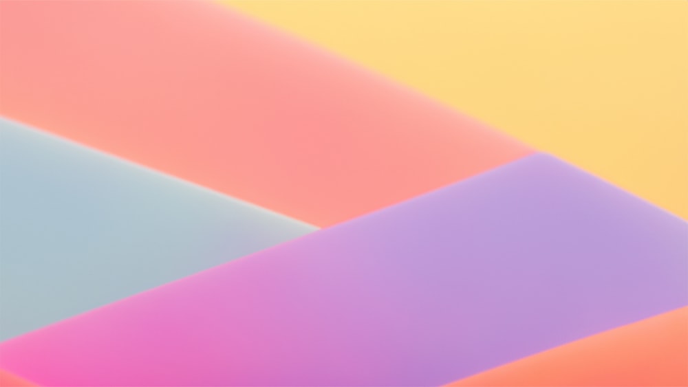 a multicolored background with a diagonal design