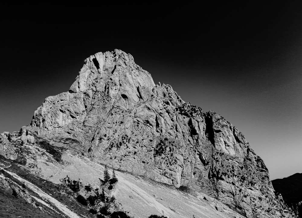 a black and white photo of a mountain