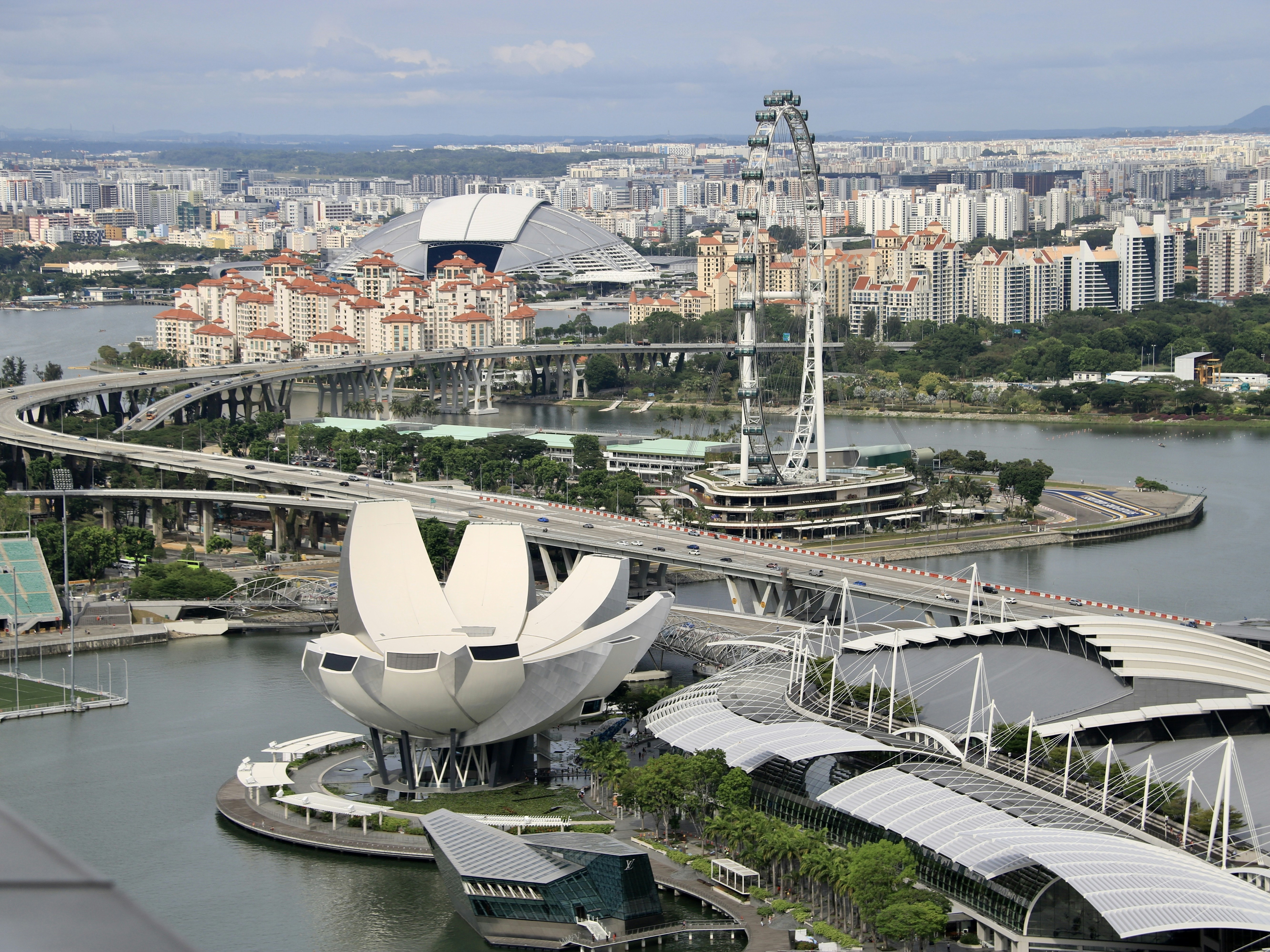 an aerial view of a city and a bridge