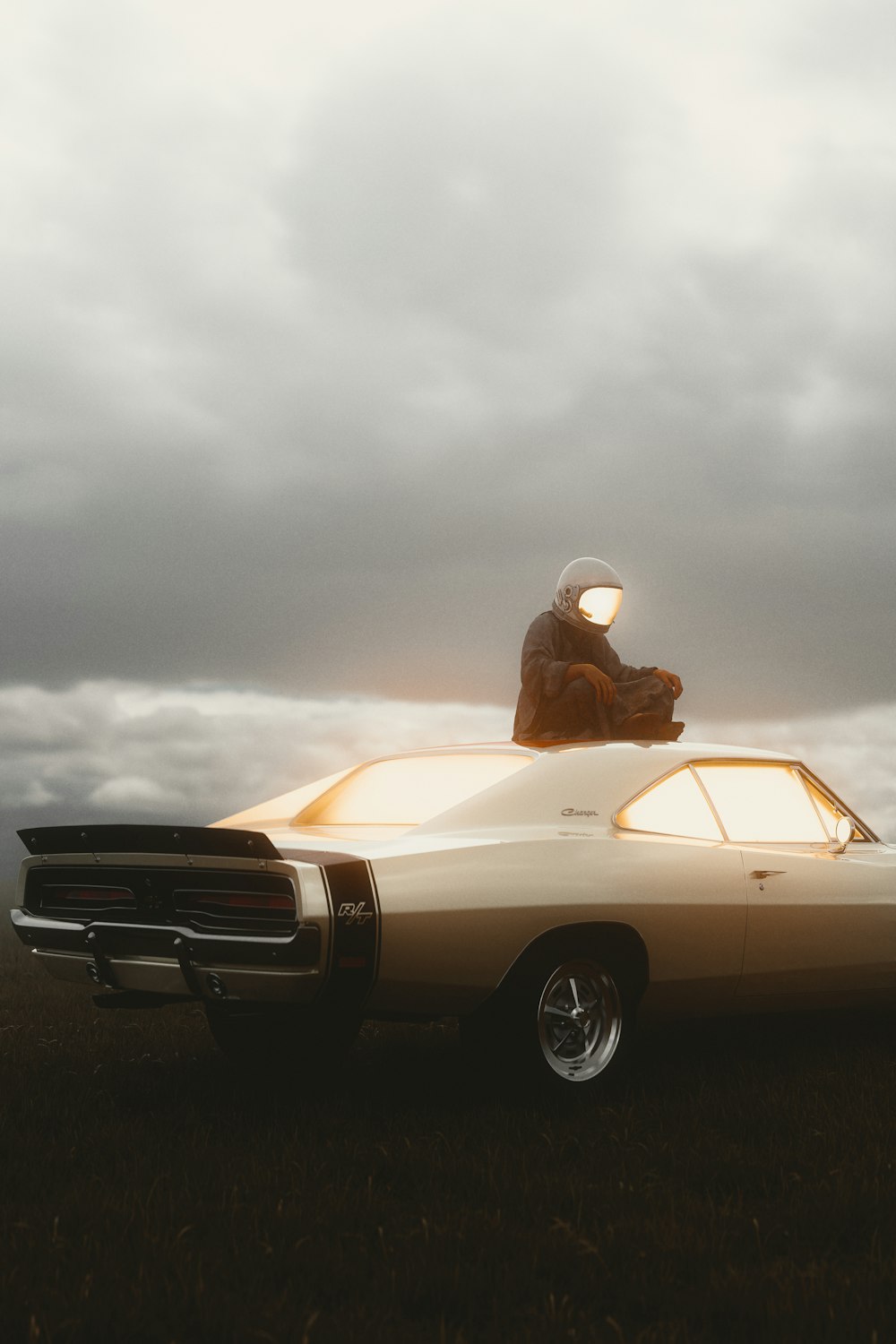 a man riding on the back of a white car