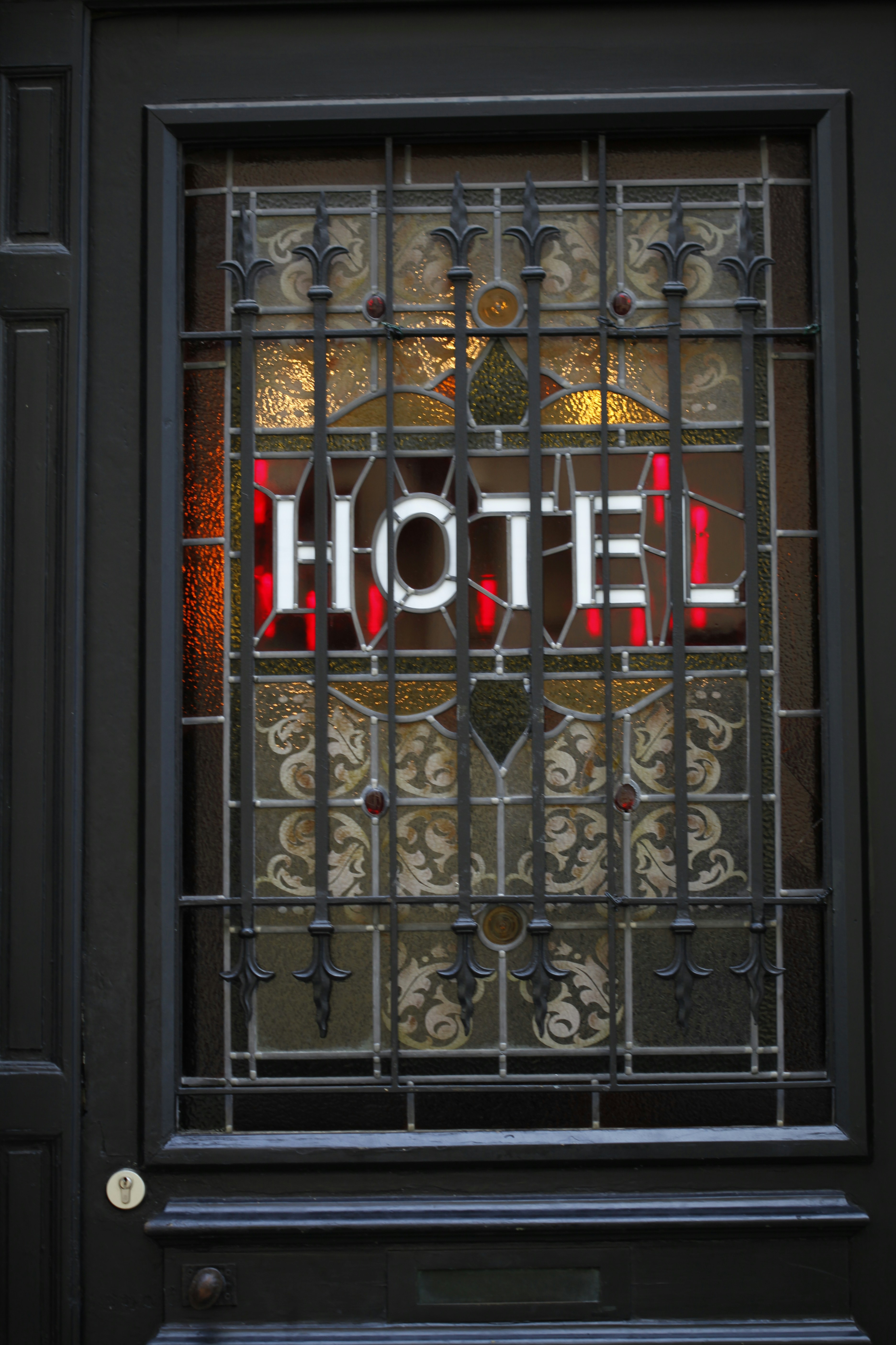 a stained glass window with the word lettoh on it