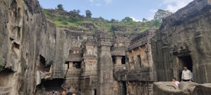The historic Bhim Band rock formation with visitors exploring its rugged beauty