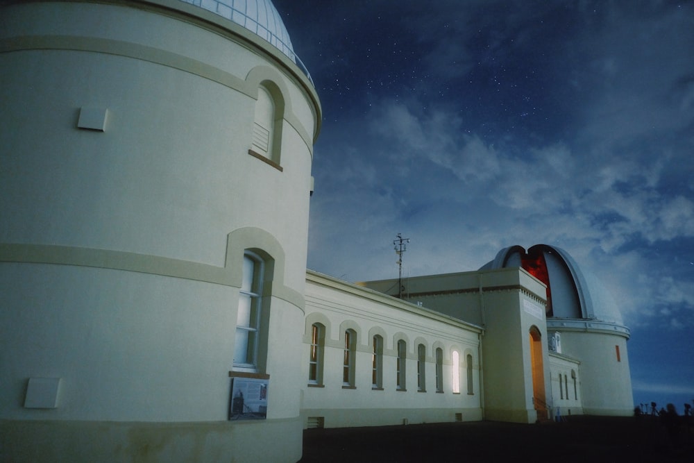 a large white building with a dome on top of it